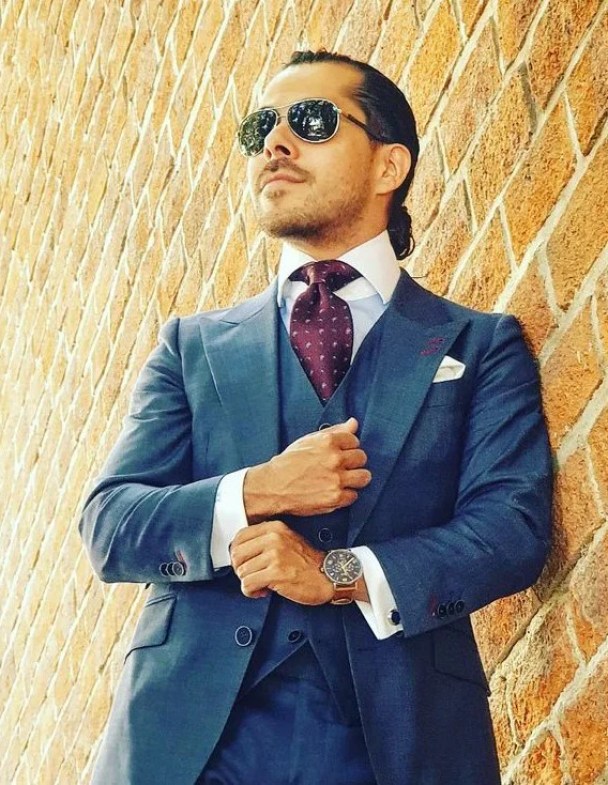 Ed ruiz menswear blogger in suit and tie and cufflinks